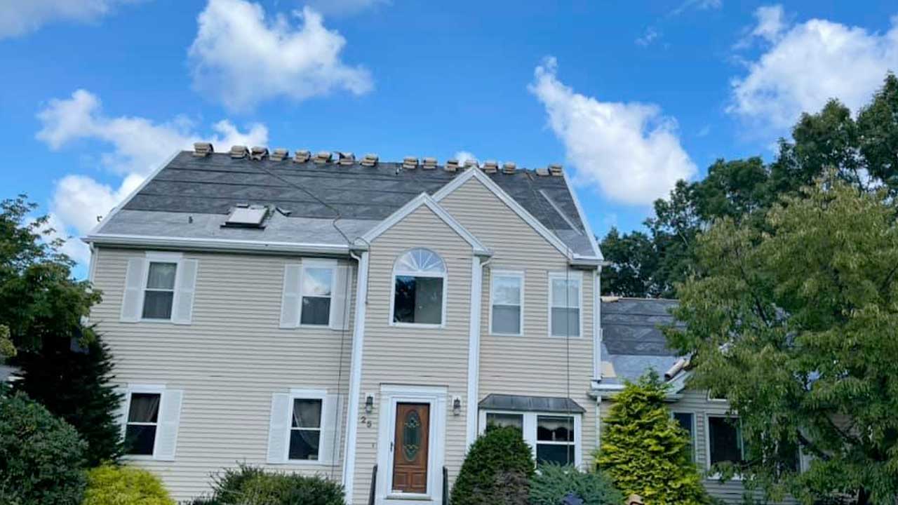 A new roof installation by Canoni Roofing in Ashland, Massachusetts