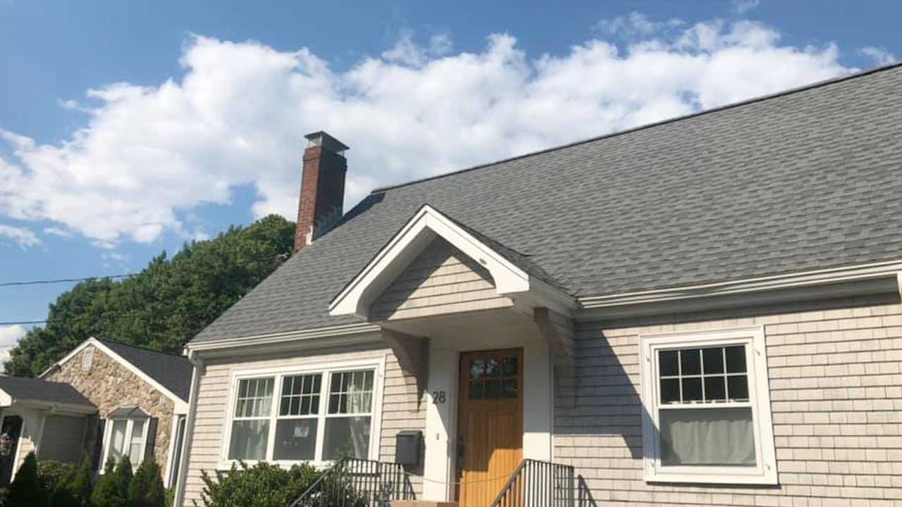 A roof replacement by Canoni Roofing in Milton, Massachusetts